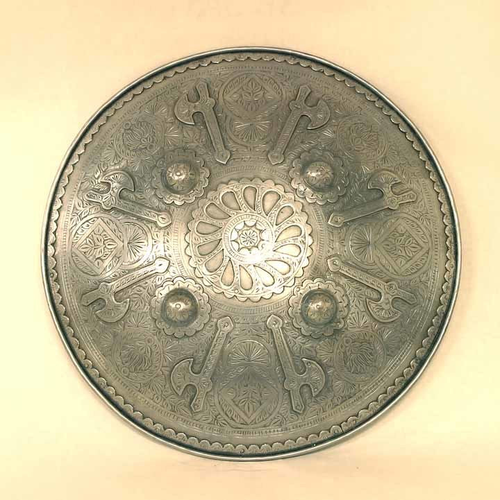 Round shield with battle-axe design